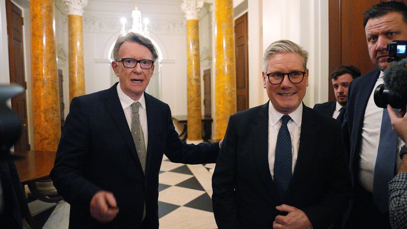 British Prime Minister Keir Starmer talks with Britain's then-ambassador to the United States Peter Mandelson last February.