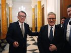 British Prime Minister Keir Starmer talks with Britain's then-ambassador to the United States Peter Mandelson last February.