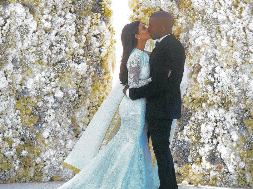 Kim Kardashian and Kanye West on their 2014 wedding day.