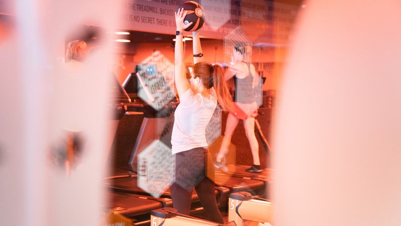 Clients participate in a class at an Orangetheory Fitness gym in Atlanta.