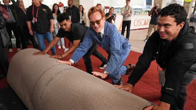 Oscars host Conan O'Brien is rolling out the red carpet as organisers roll out tighter security. 