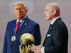 Donald Trump, here attending the World Cup draw, says it's not appropriate for Iran to compete. 
