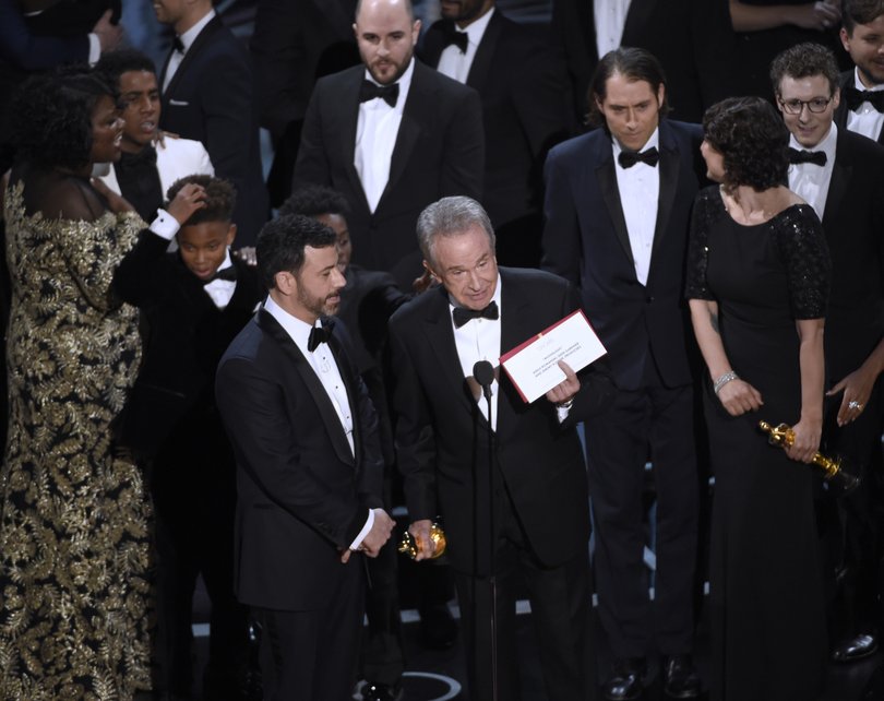 Presenter Warren Beatty shows the envelope with the actual winner for best picture on Sunday, Feb. 26, 2017.