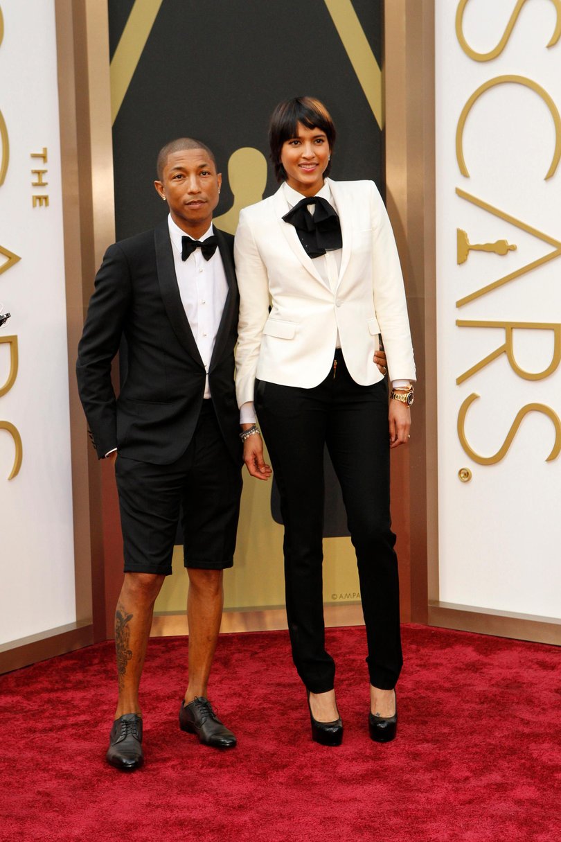 Pharrell Williams ditches suit pants for shorts.