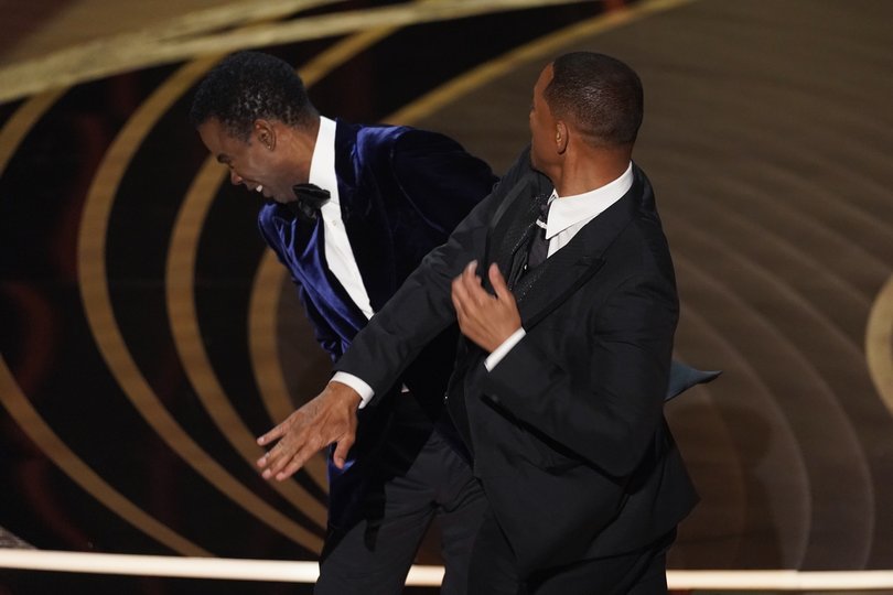 Will Smith hit Chris Rock on stage while presenting the award for best documentary feature on Sunday, March 27, 2022.
