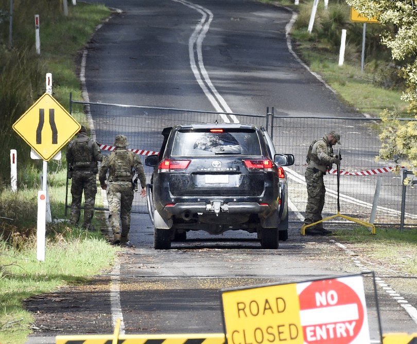 Special Operations police at the road block at the entrance to the Mount Buffalo National Park.