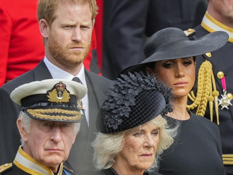 Harry and Meghan began feuding with other royals shortly after their wedding, a book claims. (AP PHOTO)