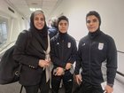 Photograph released by Iranian state media agency Tasnim News of women's football team members Mona Hammoudi, Zahra Sarbali and Zahra Meshkekar, who changed their minds about seeking asylum in Australia.