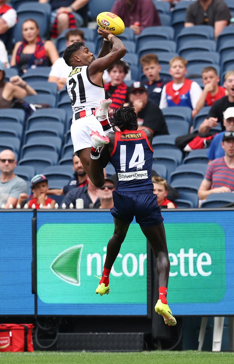 Ryan rises for the grab.