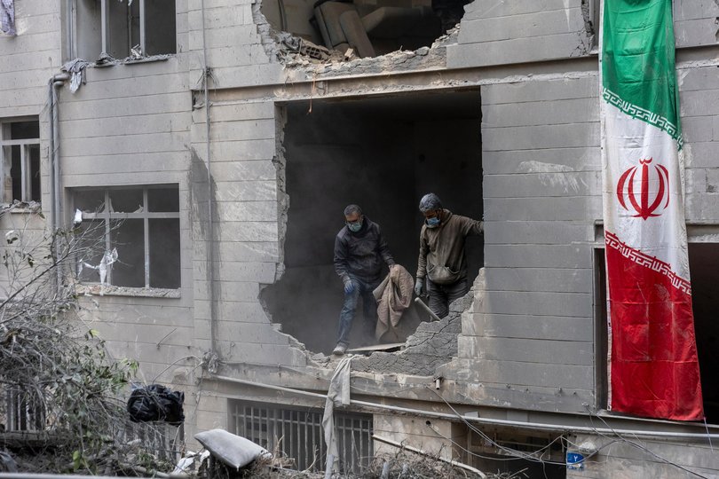 TEHRAN, IRAN - MARCH 15: People clear rubble in a house in the Beryanak District after it was damaged by missile attacks two days before, on March 15, 2026 in Tehran, Iran. The United States and Israel continued their joint attack on Iran that began on February 28. Iran retaliated by firing waves of missiles and drones at Israel, and targeting U.S. allies in the region. (Photo by Majid Saeedi/Getty Images) Majid Saeedi