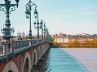 Le Pont de Pierre crossing the Garonne river, Bordeaux, France.
