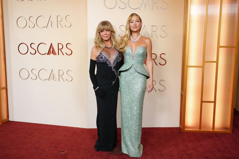 Goldie Hawn, left, and Kate Hudson arrive at the Oscars on Sunday, March 15, 2026, at the Dolby Theatre in Los Angeles. (Photo by Jordan Strauss/Invision/AP)