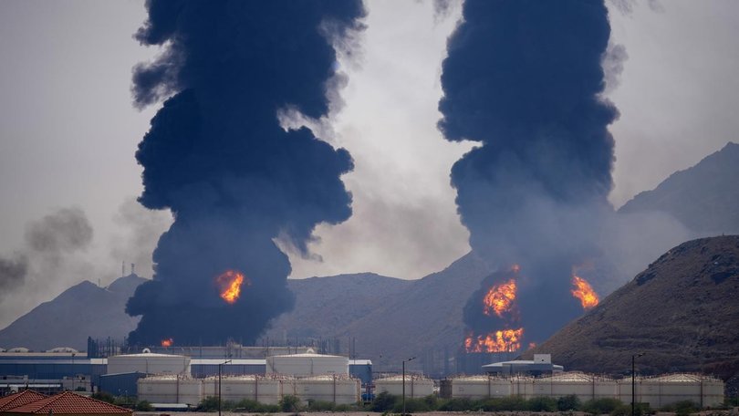 Smoke and fire rise after debris from an intercepted Iranian drone struck an oil facility, according to authorities, in Fujairah.