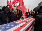 In a symbolic gesture of hatred, nails are hammered into a mock American flag-draped coffin during a rally on Iran’s Quds Day (Jerusalem Day), an annual pro-Palestinian, anti-Zionism event, in Tehran, Iran, March 13, 2026. Ever since Iran’s Islamic Revolution in 1979, which toppled a brutally repressive, staunch American ally, the two country’s governments have repeatedly cast the other as evil. (Arash Khamooshi/The New York Times)