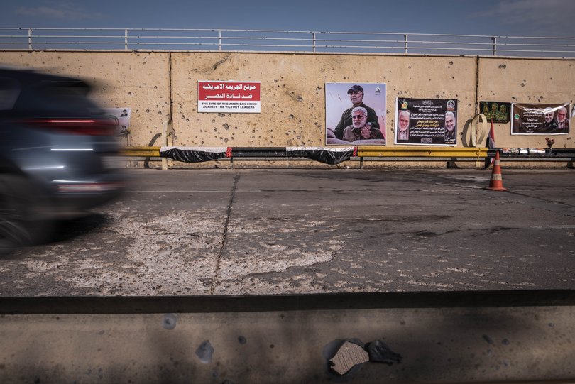 Signs in memoriam of Iranian Maj. Gen. Qassim Suleimani, who was assassinated by an American drone attack on Jan. 3 at the spot outside the airport in Baghdad, Iraq, Jan. 9, 2020.