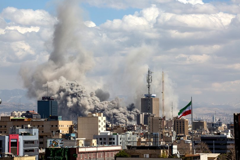 Smoke rises from a missile strike as the US and Israel continue to hit targets in the capital of Tehran, Iran.