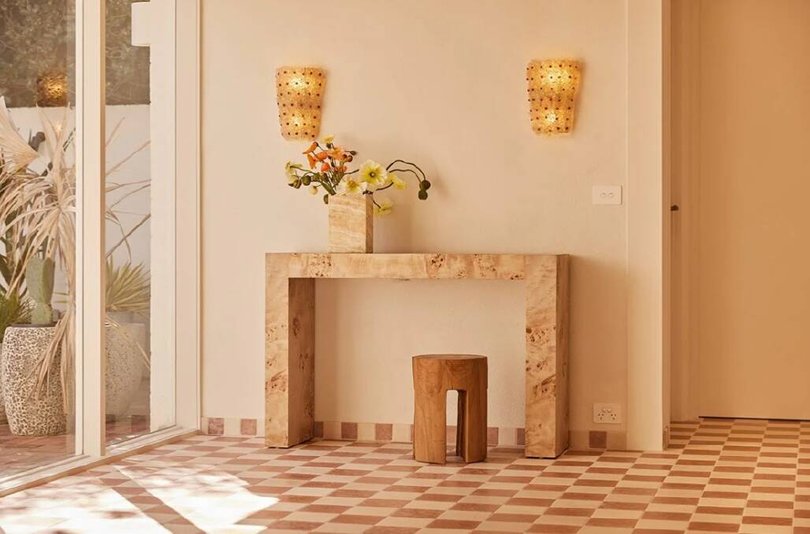 The couple's bold design choices include chequerboard flooring. Picture chantemer.com.au