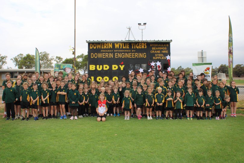 Dowerin District High School students celebrate Lance 'Buddy' Franklin's 1000 goal achievement in 2022.