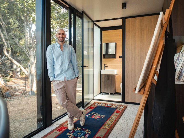 Matt Decarne founder of Elsewhere Pods in one of the designs availble at Bunnings.