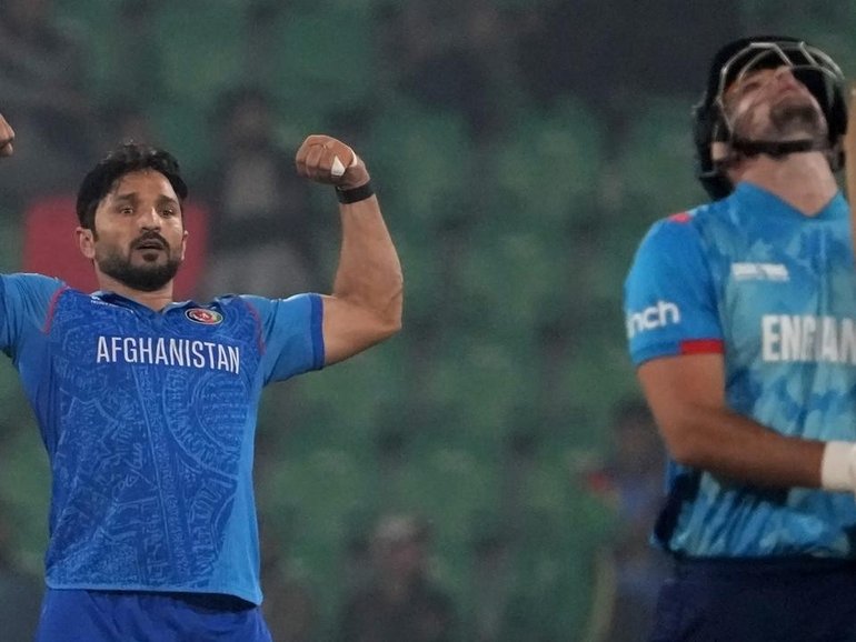 Afghanistan's Gulbadin Naib dismissies England's  Liam Livingstone at the 2025 Champions Trophy. (AP PHOTO)