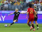 Kaitlyn Torpey of Australia passes the ball.