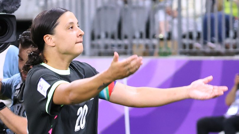 Matildas captain Sam Kerr revs up the crowd after scoring a goal.