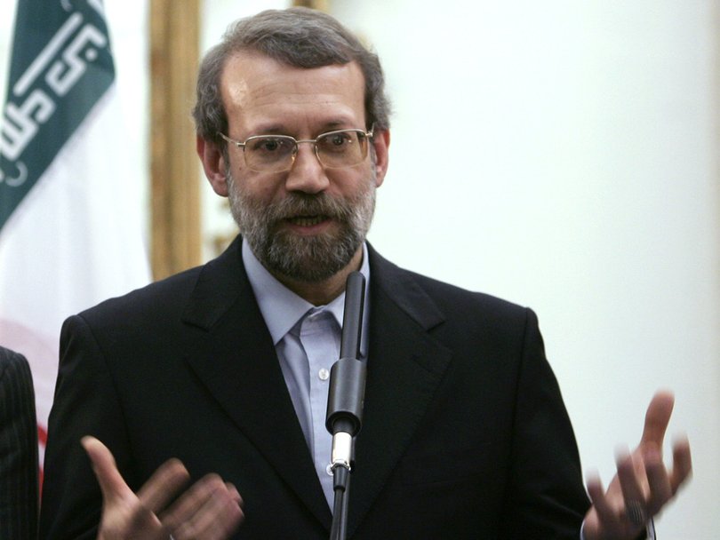 Iranian former chief nuclear negotiator Ali Larijani answers questions at a meeting in Rome with the European Union's foreign policy chief on Tehran's contentious nuclear program.