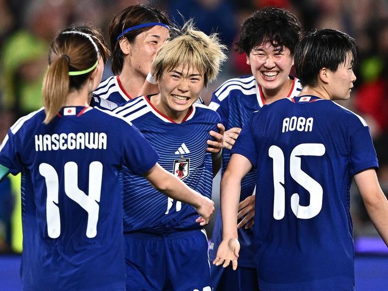 ALL SMILES: Japan are through to the Women's Asian Cup final where they will meet Australia. (Dan Himbrechts/AAP PHOTOS)