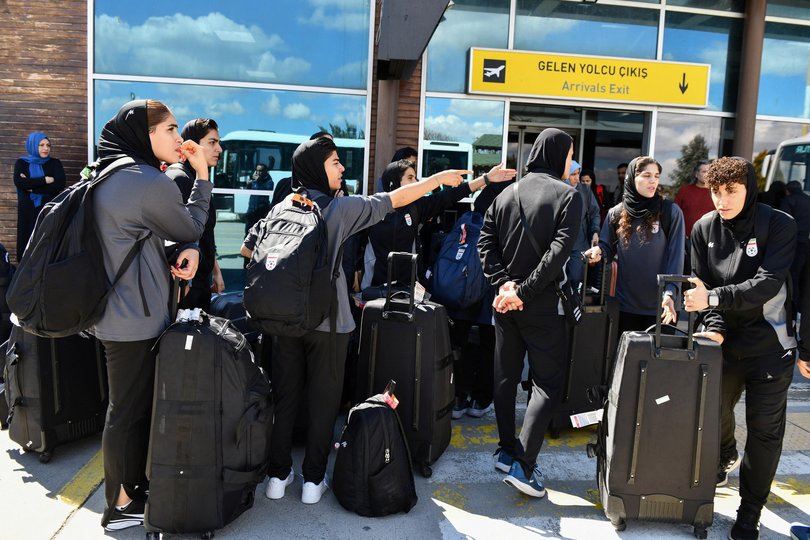 Members of the Iranian women's national soccer team outside the airport after they arrived in the eastern Turkish city of Igdir.