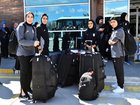 Members of the Iranian women's national soccer team outside the airport after they arrived in the eastern city of Igdir.