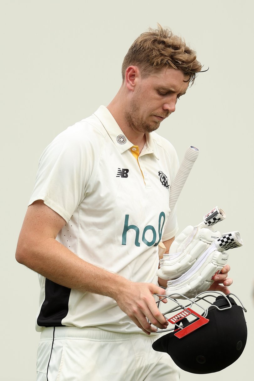 Cameron Green of Western Australia walks from the field after being dismissed.