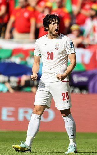 An Iranian football star has reportedly been dropped from the national squad after a social media post sparked backlash, Reuters reports.