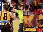 Hawthorn livewire Nick Watson has accused Sydney supporters of throwing soft drink containers at him.