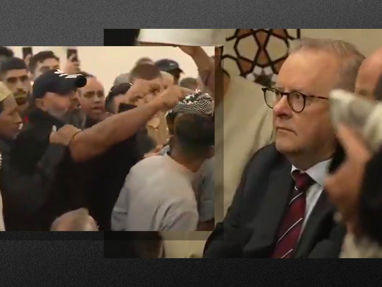 Australia's Prime Minister and Home Affairs Minister have made an abrupt exit from a mosque southwest of Sydney after they were heckled. 