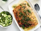 Lemon butter salmon with dill, and a pickled cucumber topping. In this simple but showstopping recipe, a honey-lemon sauce glosses a leaner cut of salmon with richness. Food stylist: Rebecca Jurkevich.  