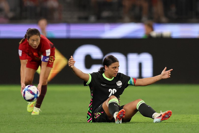 Sam Kerr of Australia sits on the floor and gestures in frustration during the AFC Women's Asian Cup Australia 2026 Semi Final