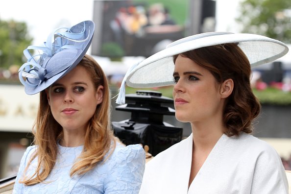 The public is divided as Princess Beatrice and Princess Eugenie face royal title pressure.