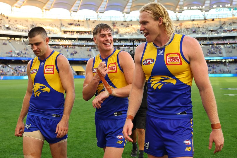 Harley Reid celebrates the win with teammates.