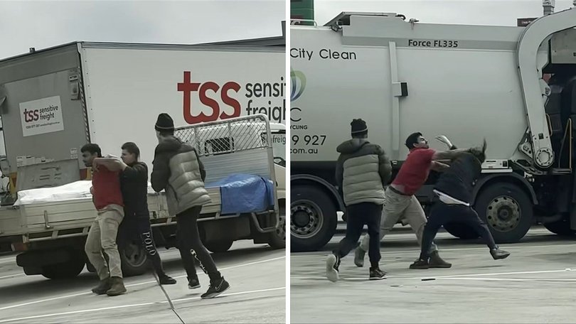 A truck driver, wearing red, fought back against two would-be carjackers at a service station in Scoresby.