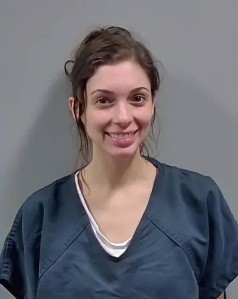 Nicolette Keough was all smiles when she had her mugshot taken.