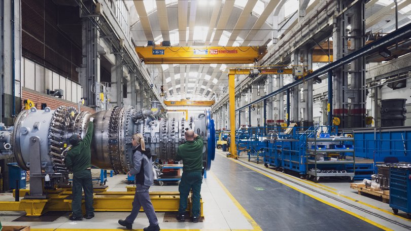 Workers at a factory in Florence, Italy, owned by Baker Hughes, an oil field service company that makes the kinds of turbines being used off grid, Nov. 26, 2025. Seeking power for data centers, Meta and other companies plan to use equipment that is expensive and polluting. (Clara Vannucci/The New York Times)
