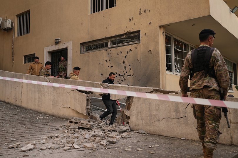 Army soldiers check the site where intercepted missiles fell in Sahel Alma, north of Beirut, Tuesday, March 24, 2026. (AP Photo/Hassan Ammar)