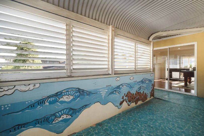 Wall murals created by artist Mitch Revs.