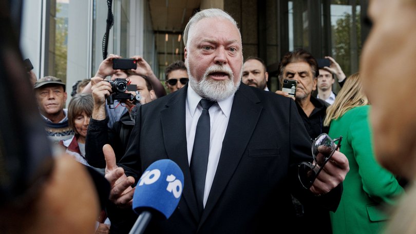 Kyle Sandilands leaves the Federal court.