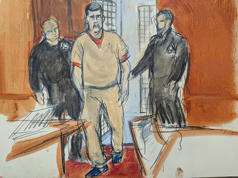 Former Venezuelan President Nicolas Maduro is escorted into a Manhattan federal courtroom.