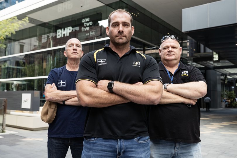 Electrical Trades Union Secretary Adam Woodage speaks to the media today outside BHP HQ. Also pictured are ETUWA Lawyer Kevin Sneddon and ETUWA official Rory Cumins.