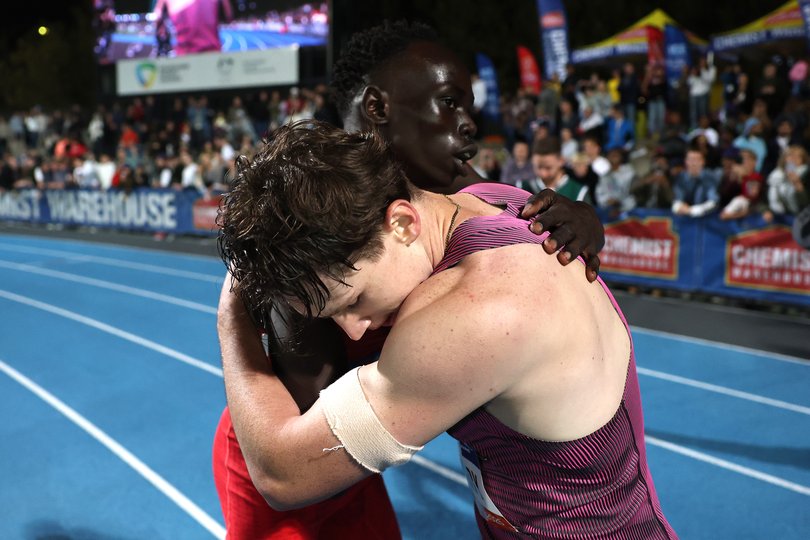 Gout Gout congratulates race winner Lachlan Kennedy after competing in the Peter Norman Men’s 200m Finals.