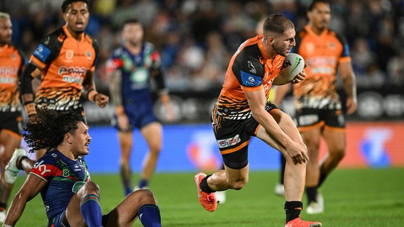 Adam Doueihi (c) played a big attacking role as Wests Tigers toppled the Warriors in Auckland. (