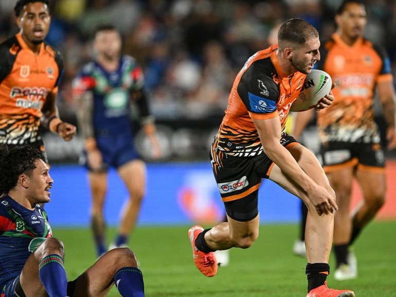 Adam Doueihi (c) played a big attacking role as Wests Tigers toppled the Warriors in Auckland. (