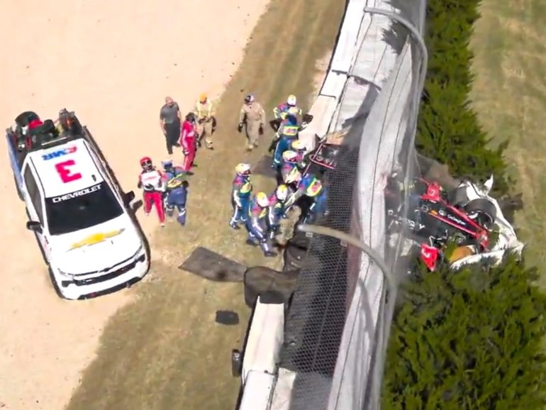 Scott McLaughlin crashed through the fence in practice.